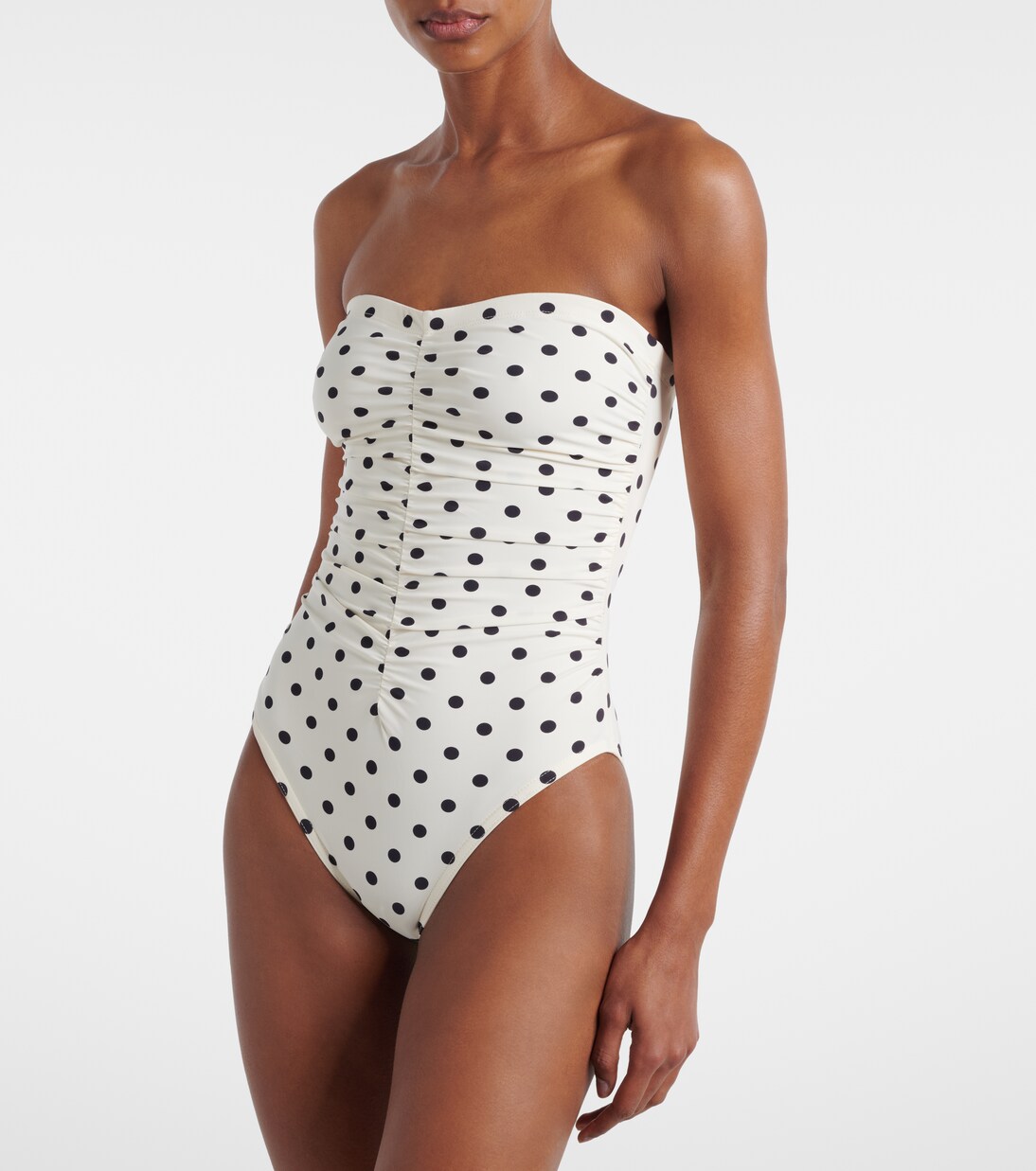 Gathered polka-dot bandeau swimsuit | Karla Colletto