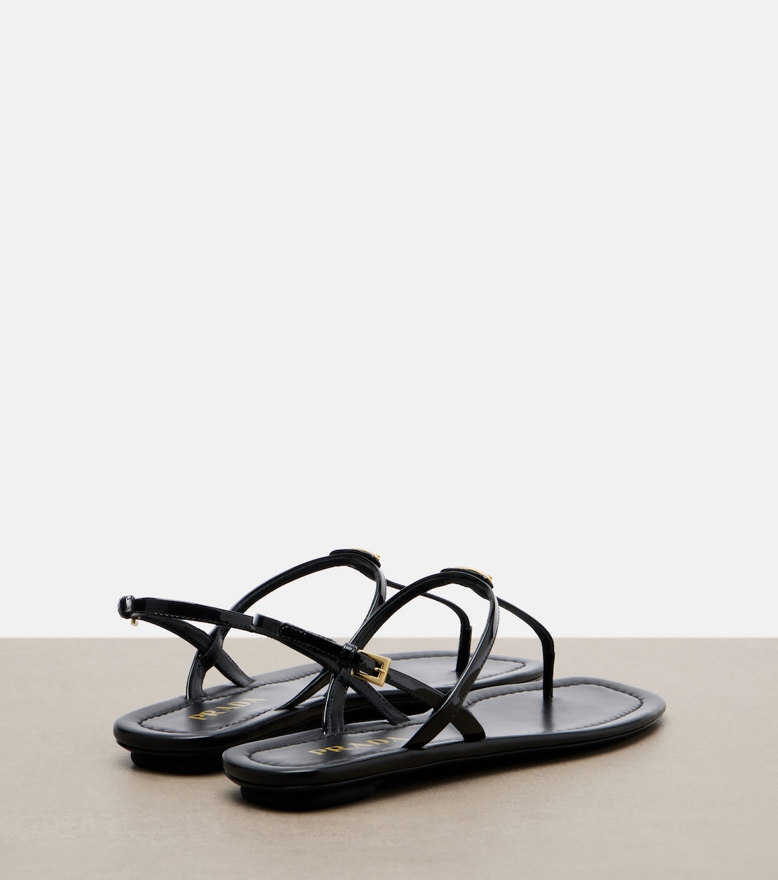 Patent leather thong sandals | Prada