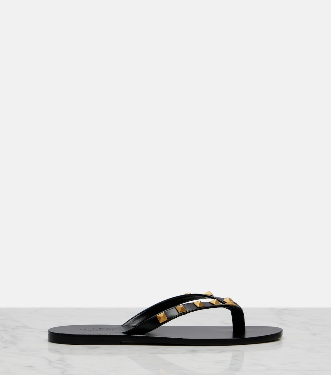 Rockstud leather thong sandals | Valentino Garavani