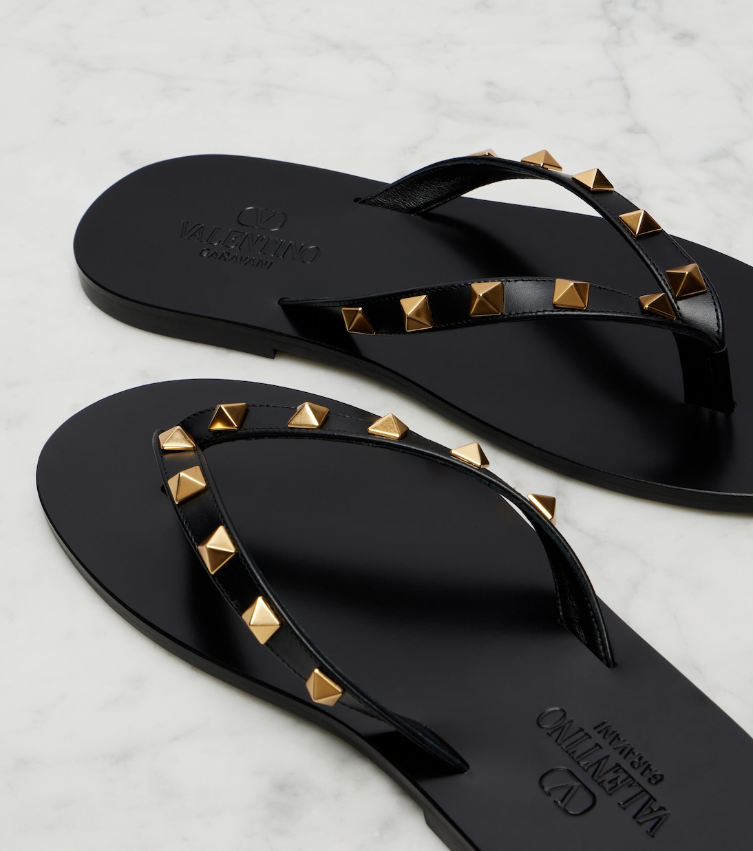 Rockstud leather thong sandals | Valentino Garavani