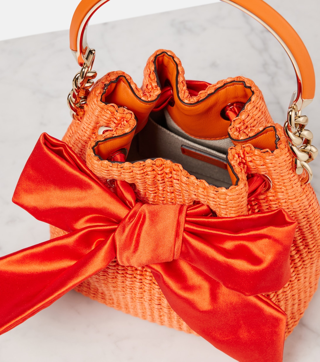 Bon Bon bow-detail raffia bucket bag | Jimmy Choo