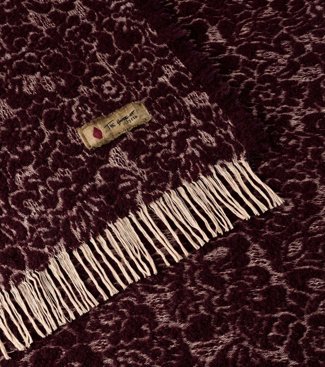 Malghe wool and cotton-blend throw | The House of Lyria