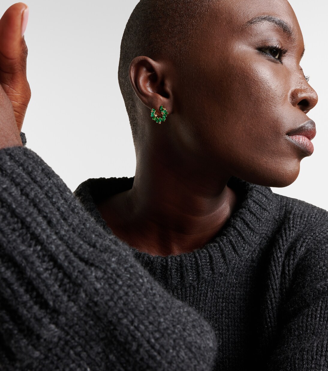 Izzy Sideway Spiral 18kt gold earrings with emeralds and diamonds | Suzanne Kalan