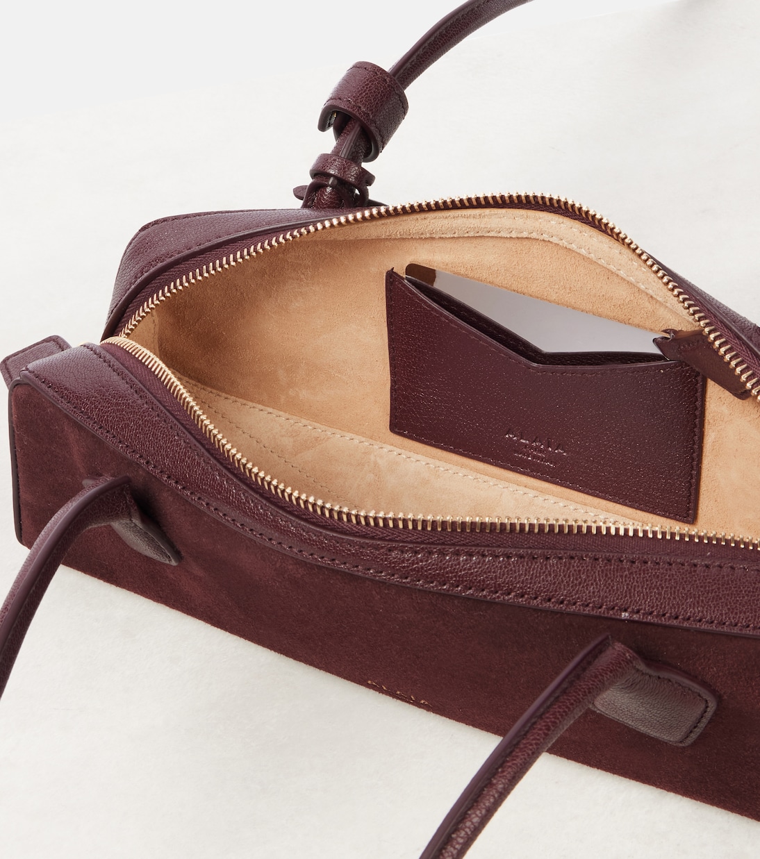 Le Teckel Small suede shoulder bag | Alaïa