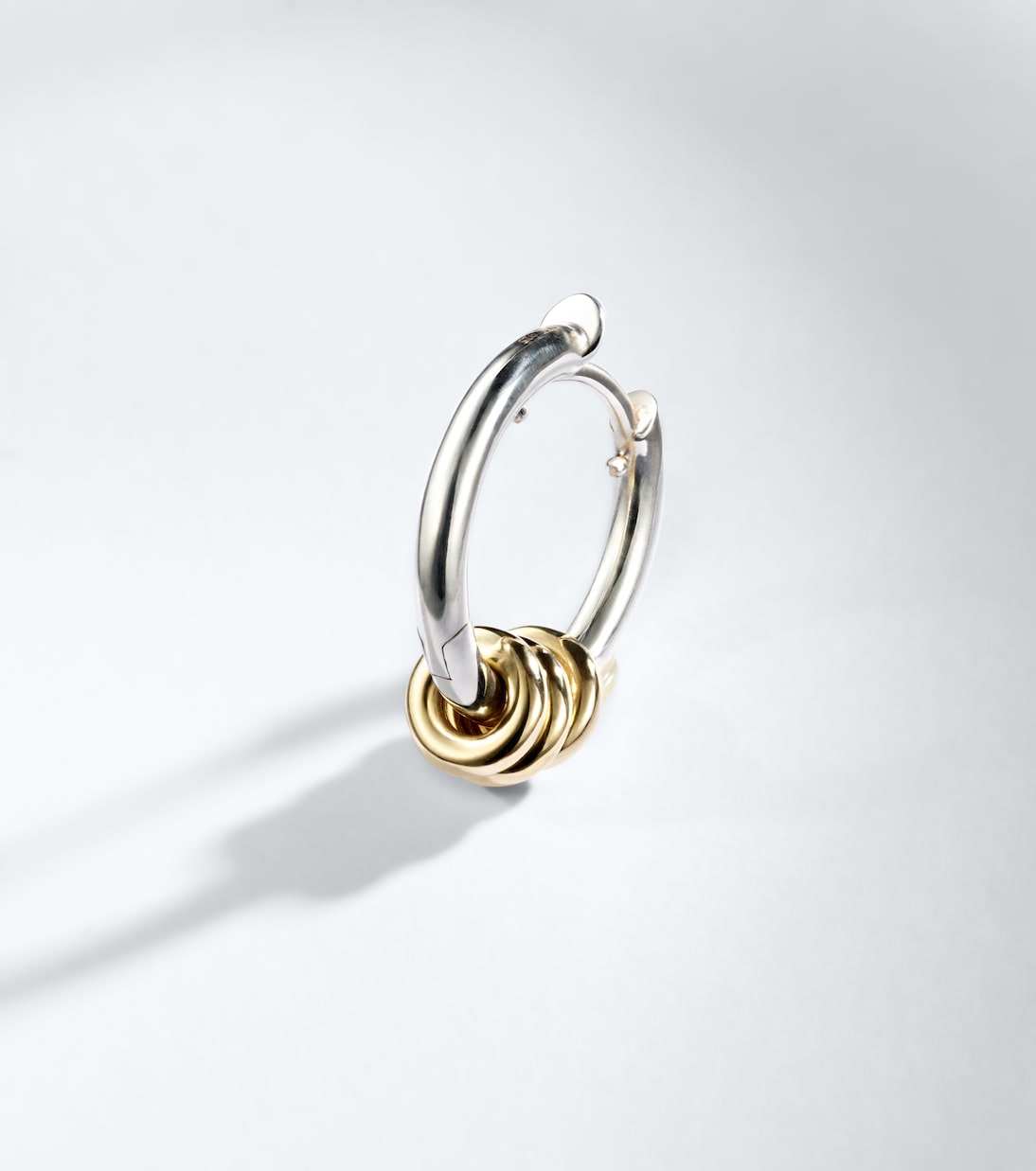 Nevine Max sterling silver and 18kt gold single hoop earring | Spinelli Kilcollin