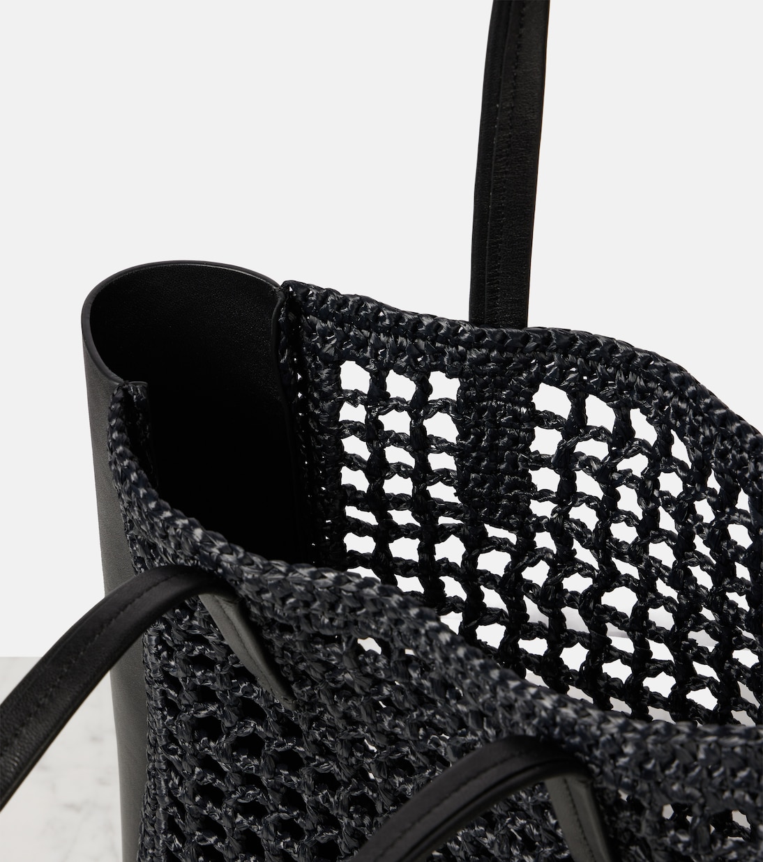 Zoe Small leather-trimmed raffia tote bag | Khaite