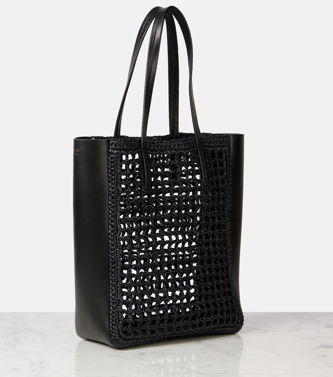 Zoe Small leather-trimmed raffia tote bag | Khaite