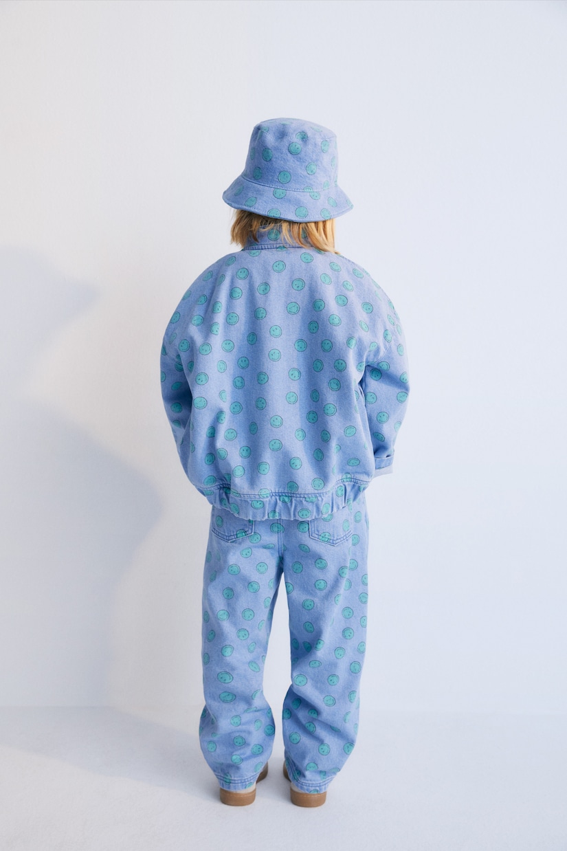 Smiley printed jeans | The New Society