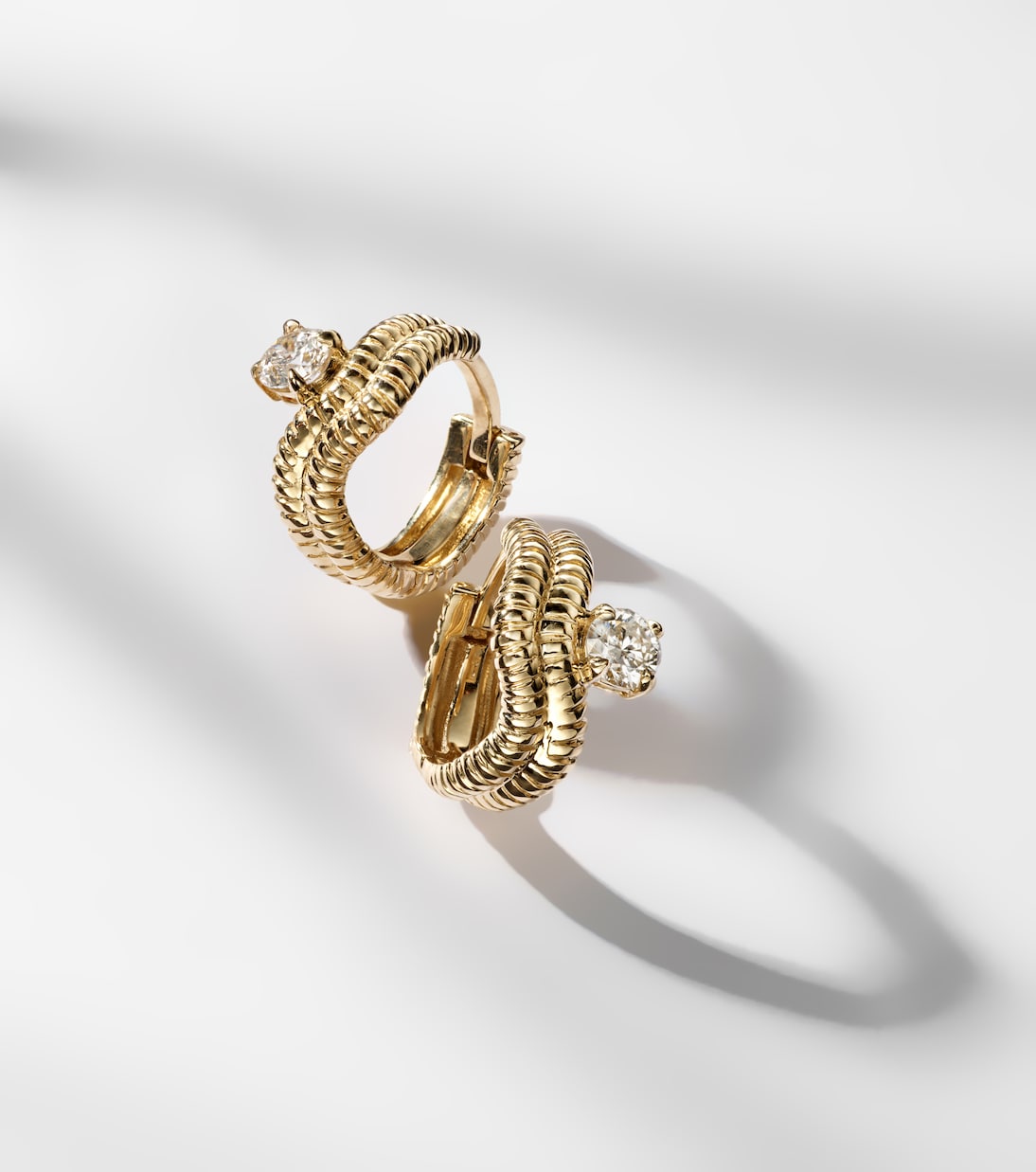 Second Hole Freddy 14kt gold huggie earrings with diamonds | Stone and Strand