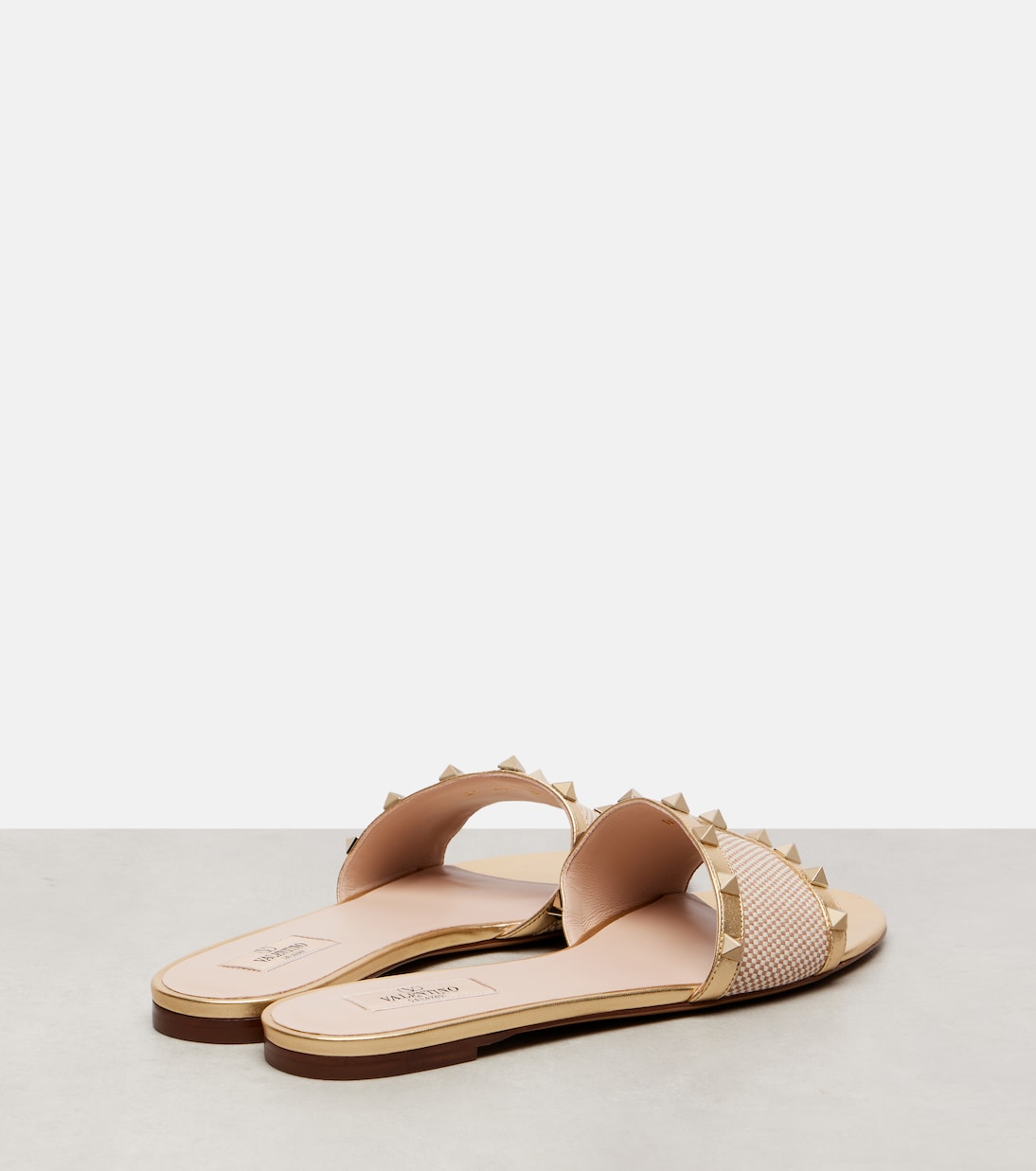Rockstud leather-trimmed slides | Valentino Garavani