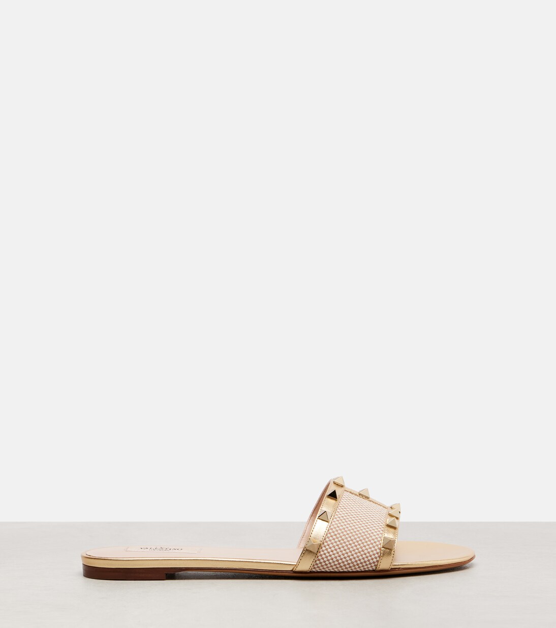 Rockstud leather-trimmed slides | Valentino Garavani