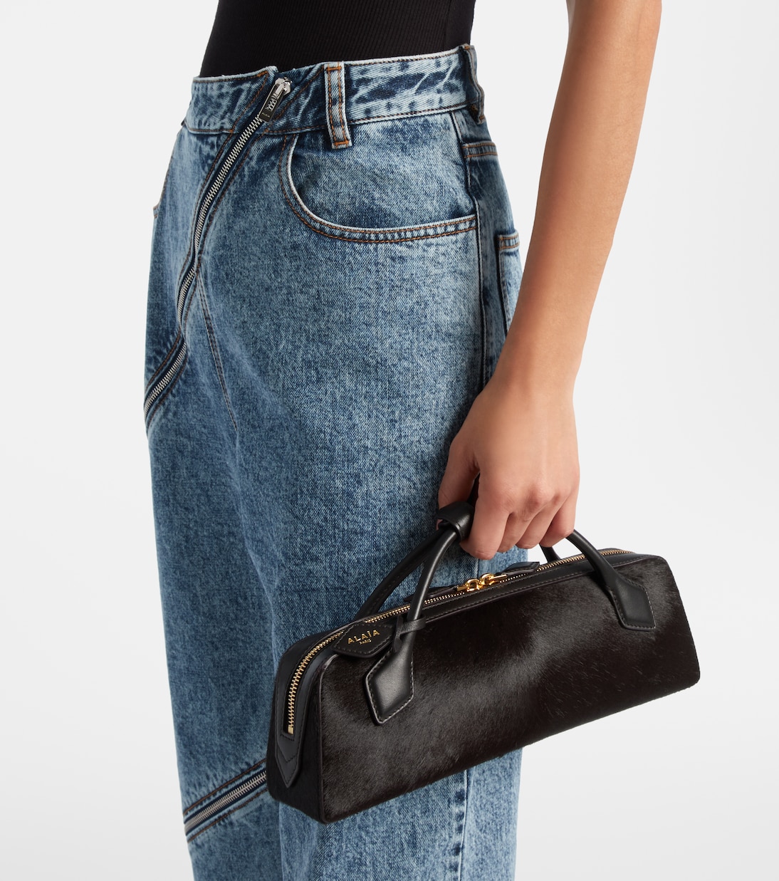 Le Teckel Small calf hair clutch | Alaïa
