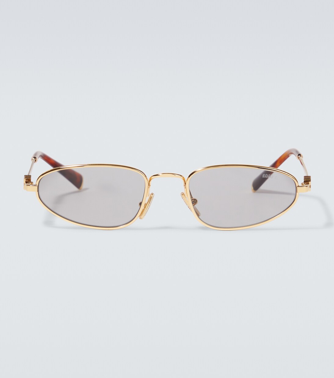 Miu Miu Logo oval sunglasses | Miu Miu