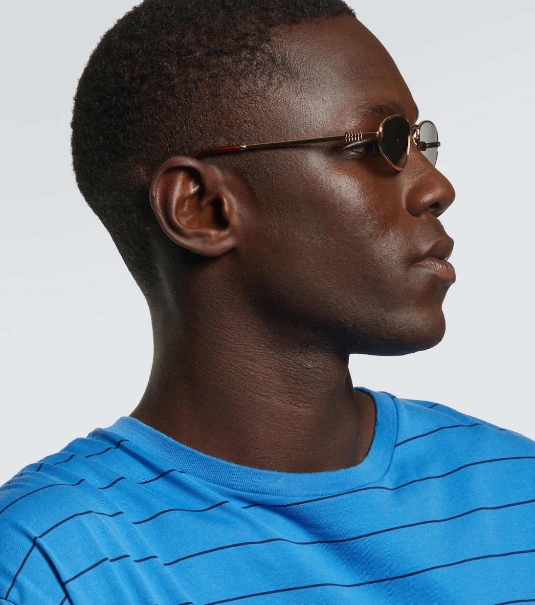 Miu Miu Logo oval sunglasses | Miu Miu