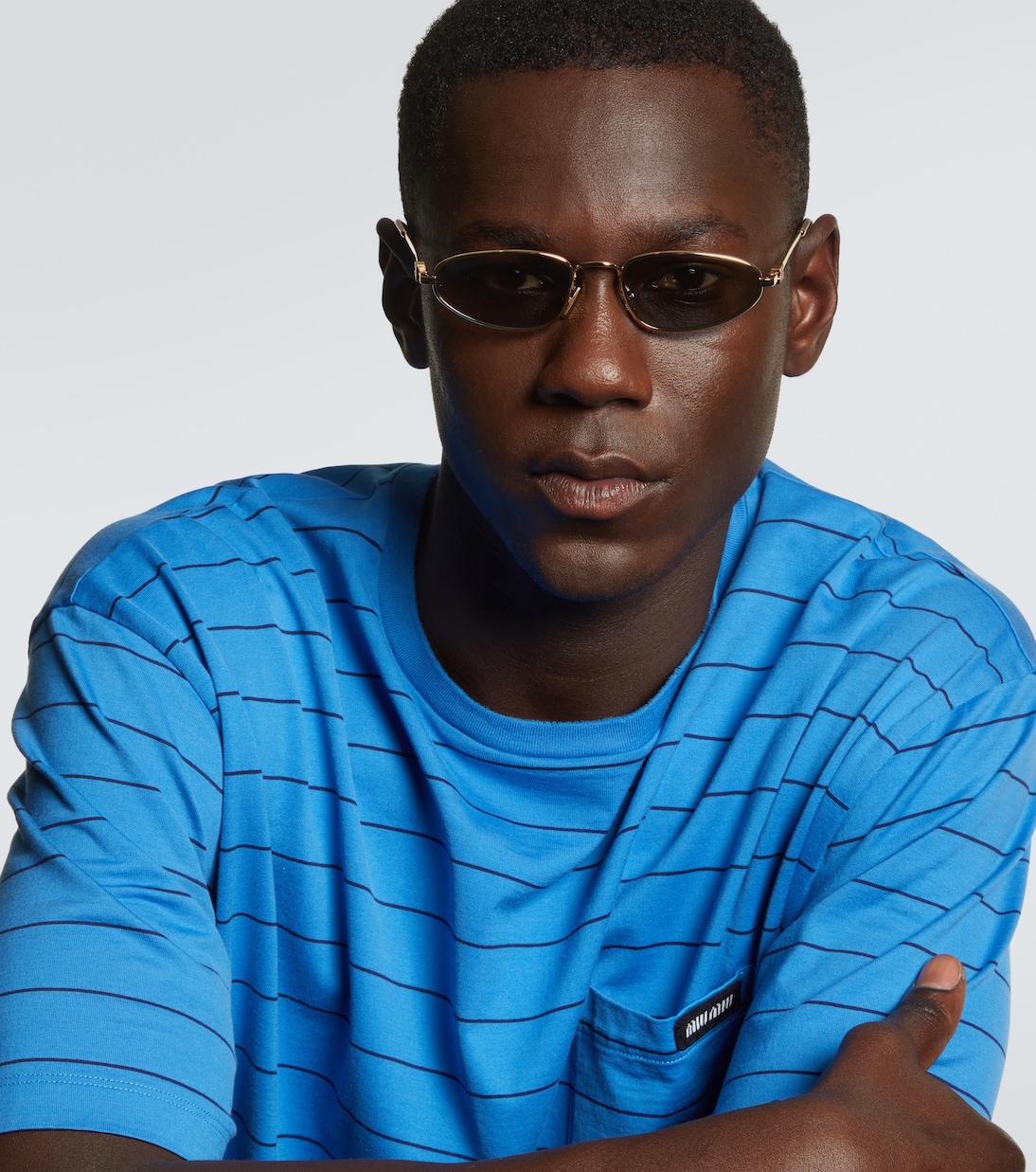 Miu Miu Logo oval sunglasses | Miu Miu