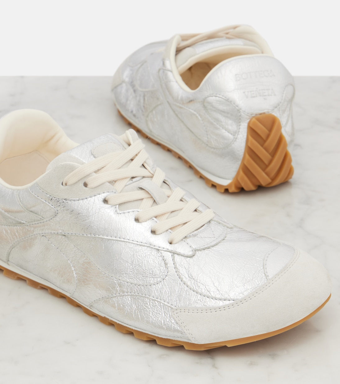 Sneakers Orbit Flash aus Metallic-Leder | Bottega Veneta
