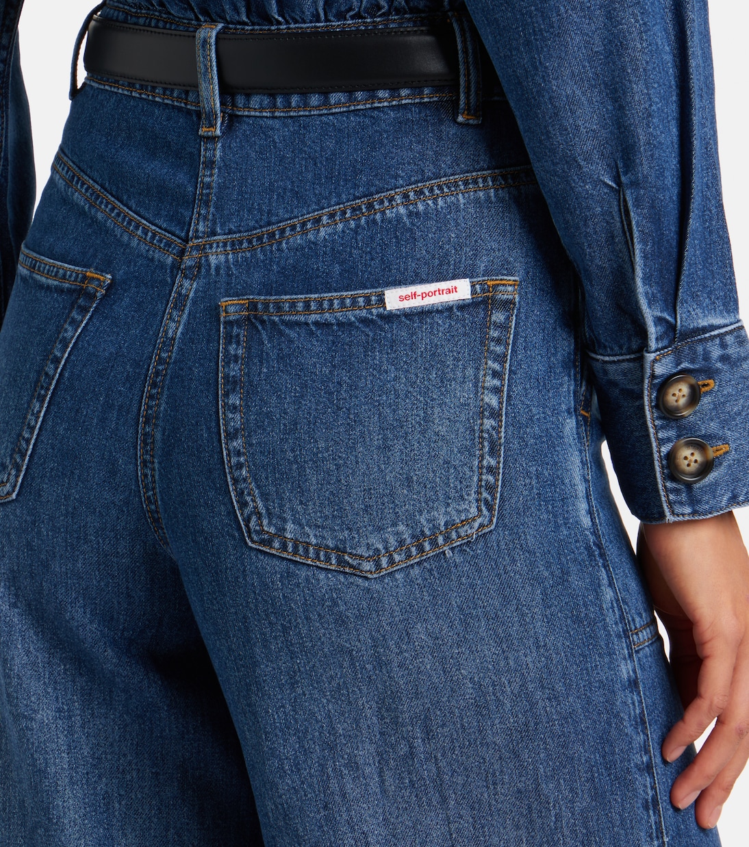 Belted denim jumpsuit | Self-Portrait
