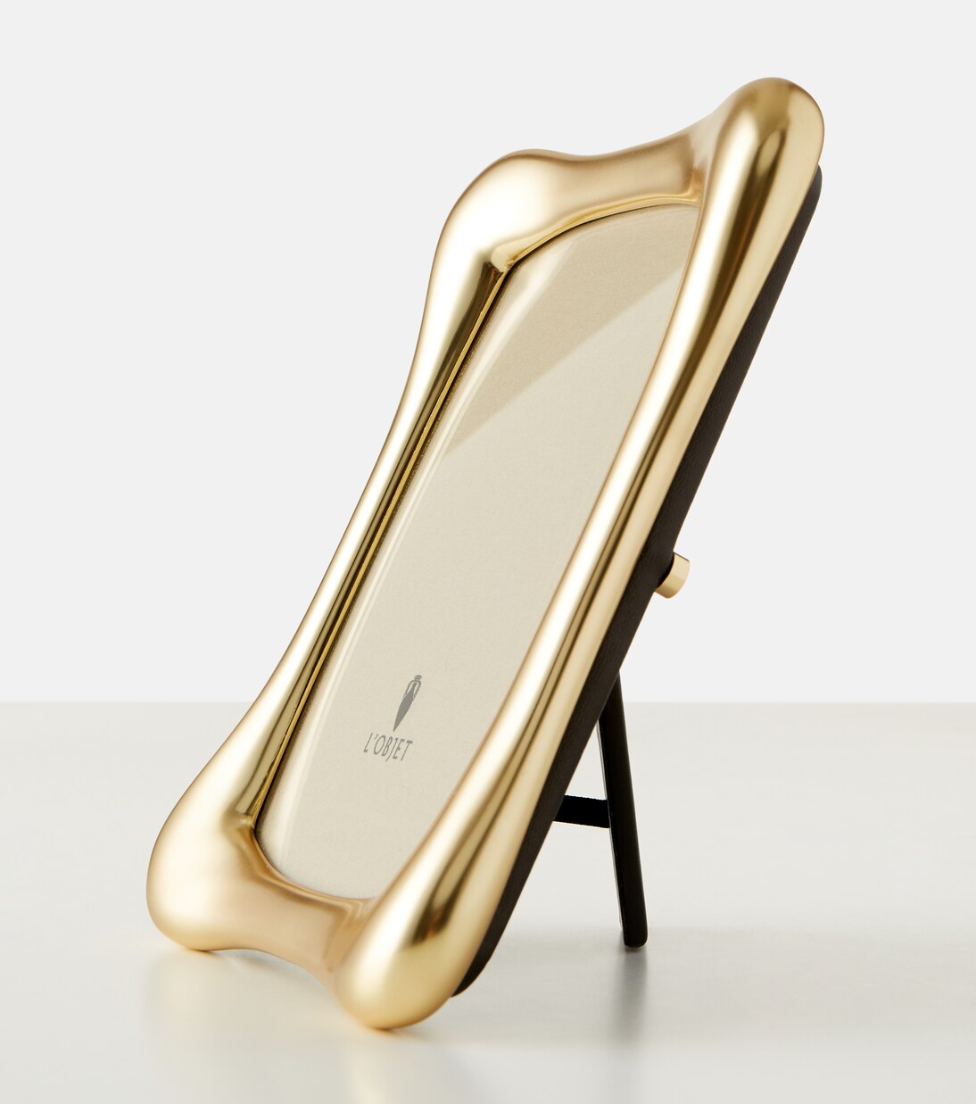 Anton brass-plated picture frame | L'Objet