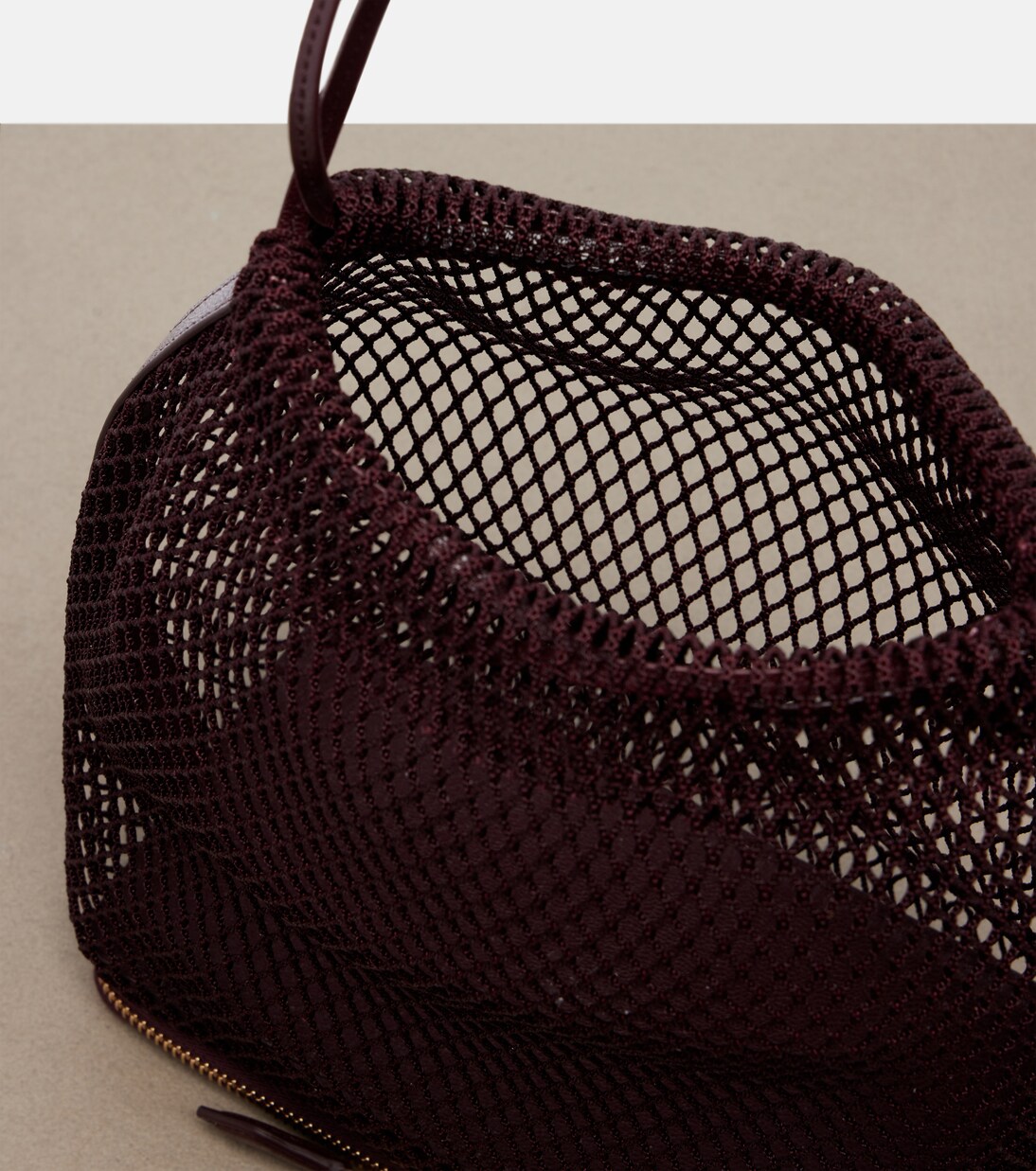 Le Pochon fishnet bucket bag | Alaïa
