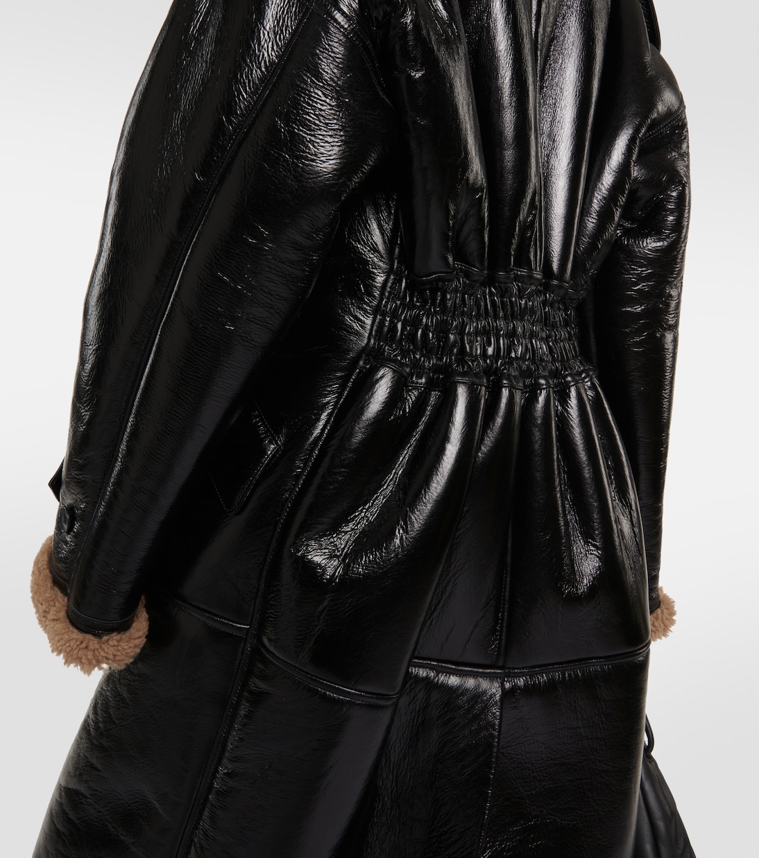 Jordan shearling-trimmed leather coat | The Mannei