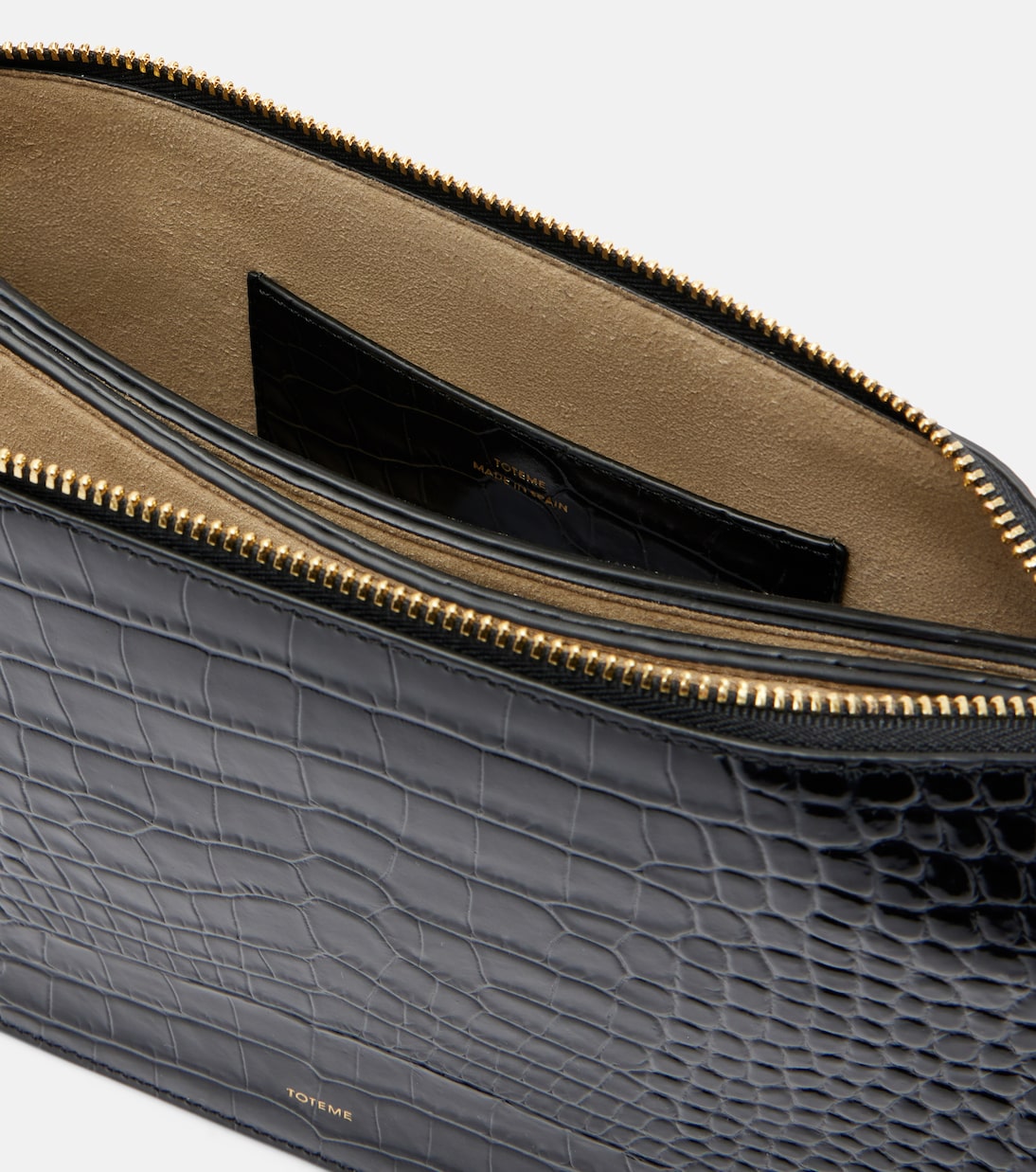 حقيبة كلاتش من الجلد بنقشات جلد التمساح Threefold | Toteme