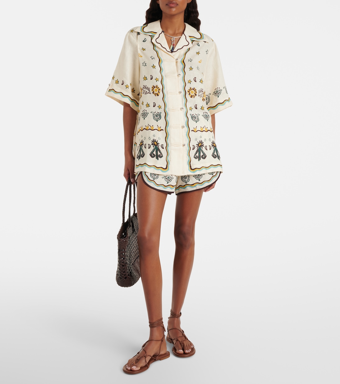 Sun Dancer printed linen shorts | Alémais