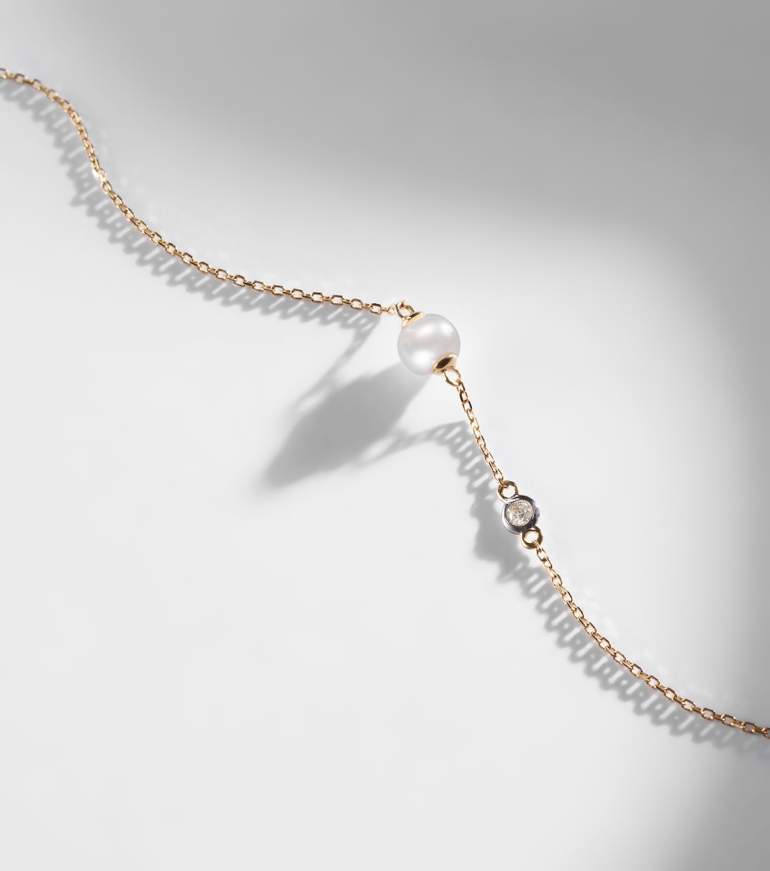 14kt gold chain bracelet with diamonds and pearls | Mateo