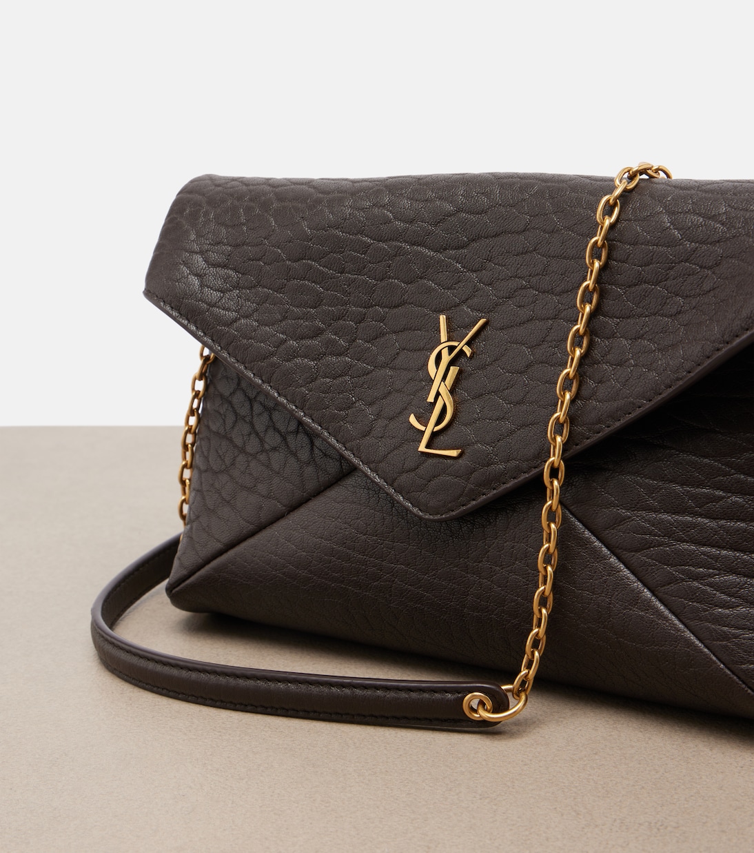 Cassandre Small leather clutch | Saint Laurent