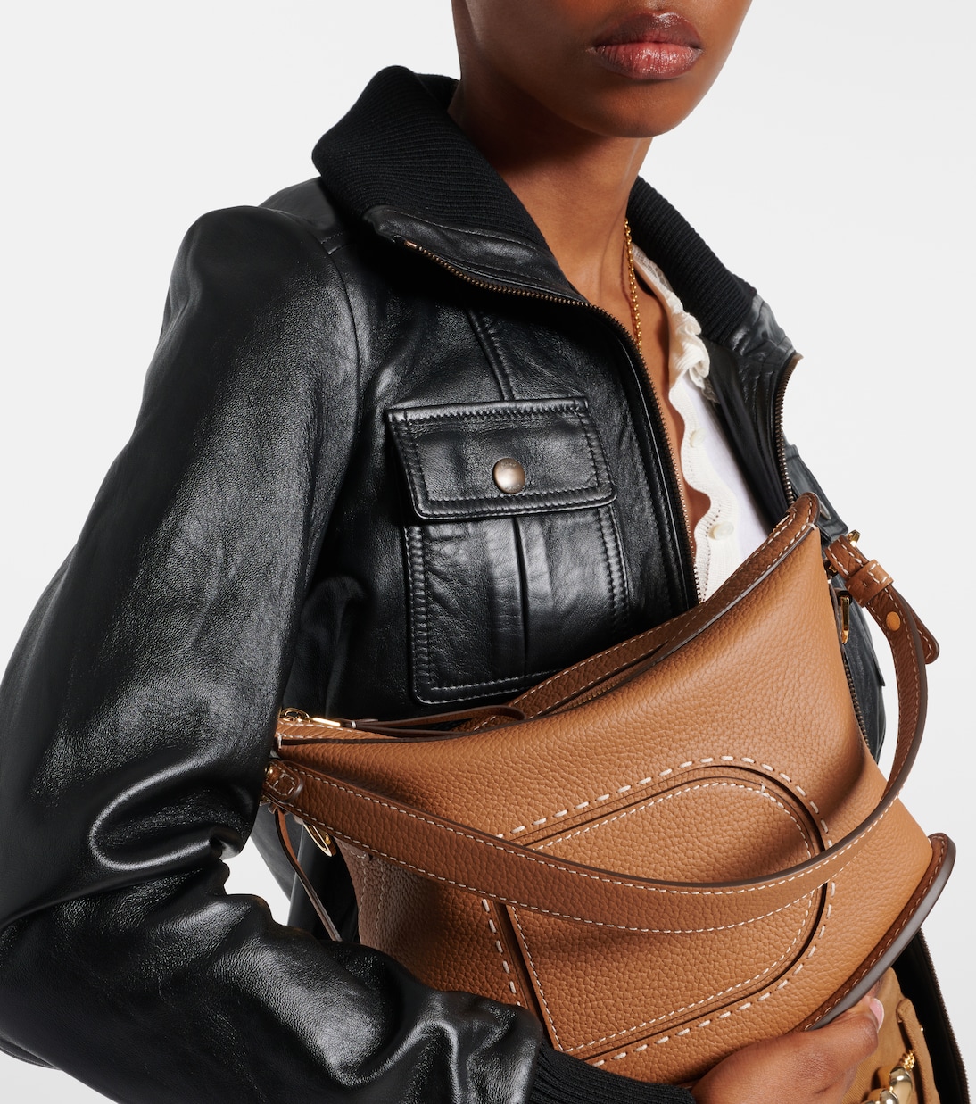 Schultertasche Pin Swing Surpiqué aus Leder | Delvaux