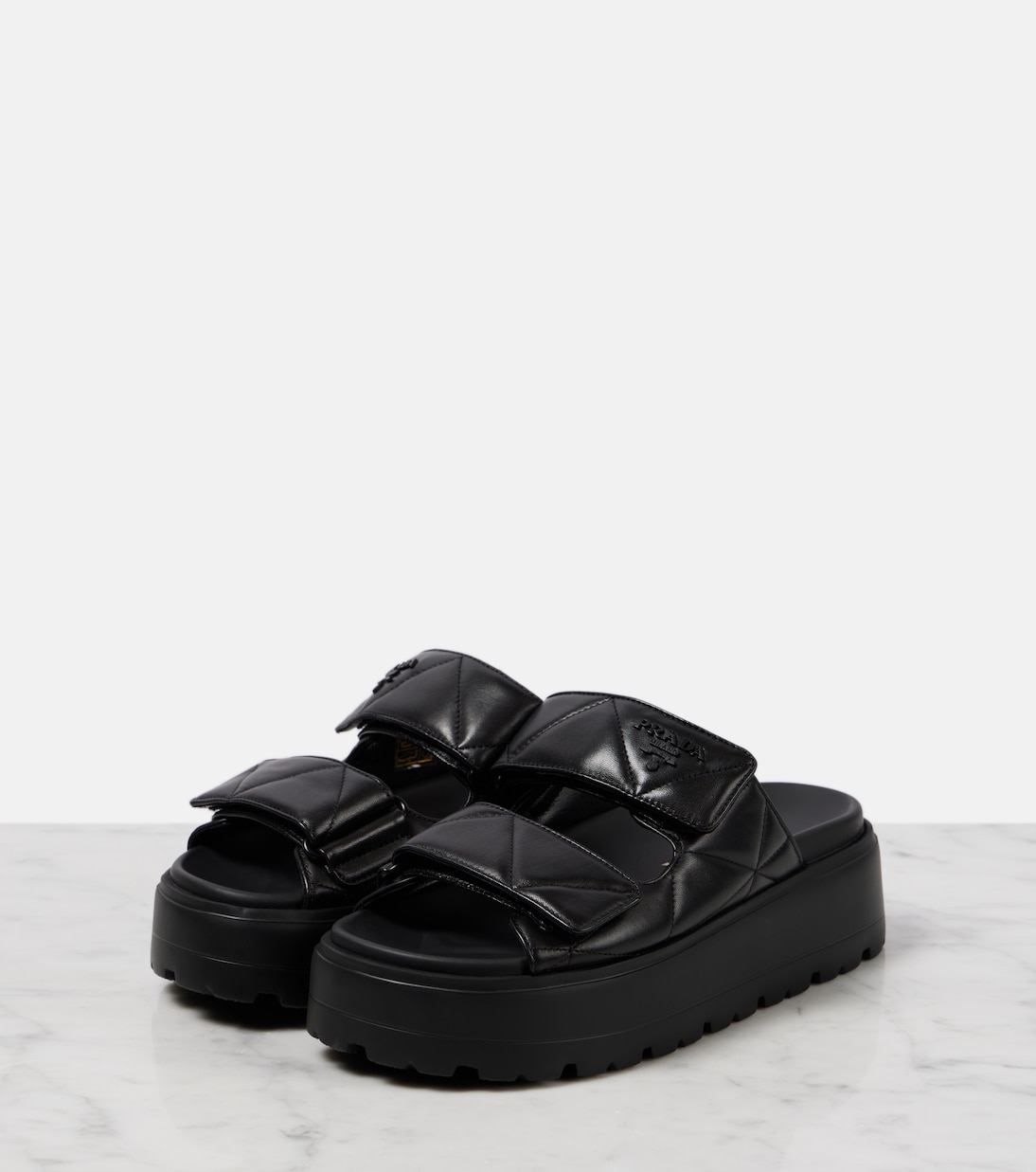 Quilted leather platform sandals | Prada