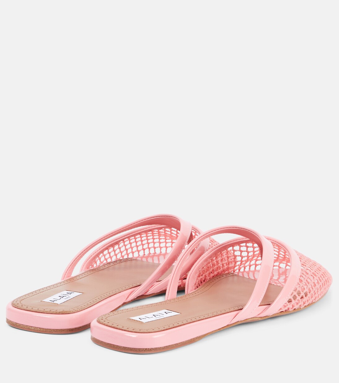 Patent leather-trimmed fishnet mules | Alaïa