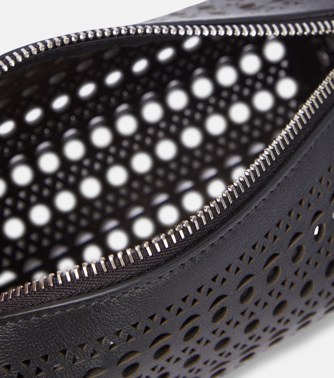 Tube perforated leather shoulder bag | Alaïa