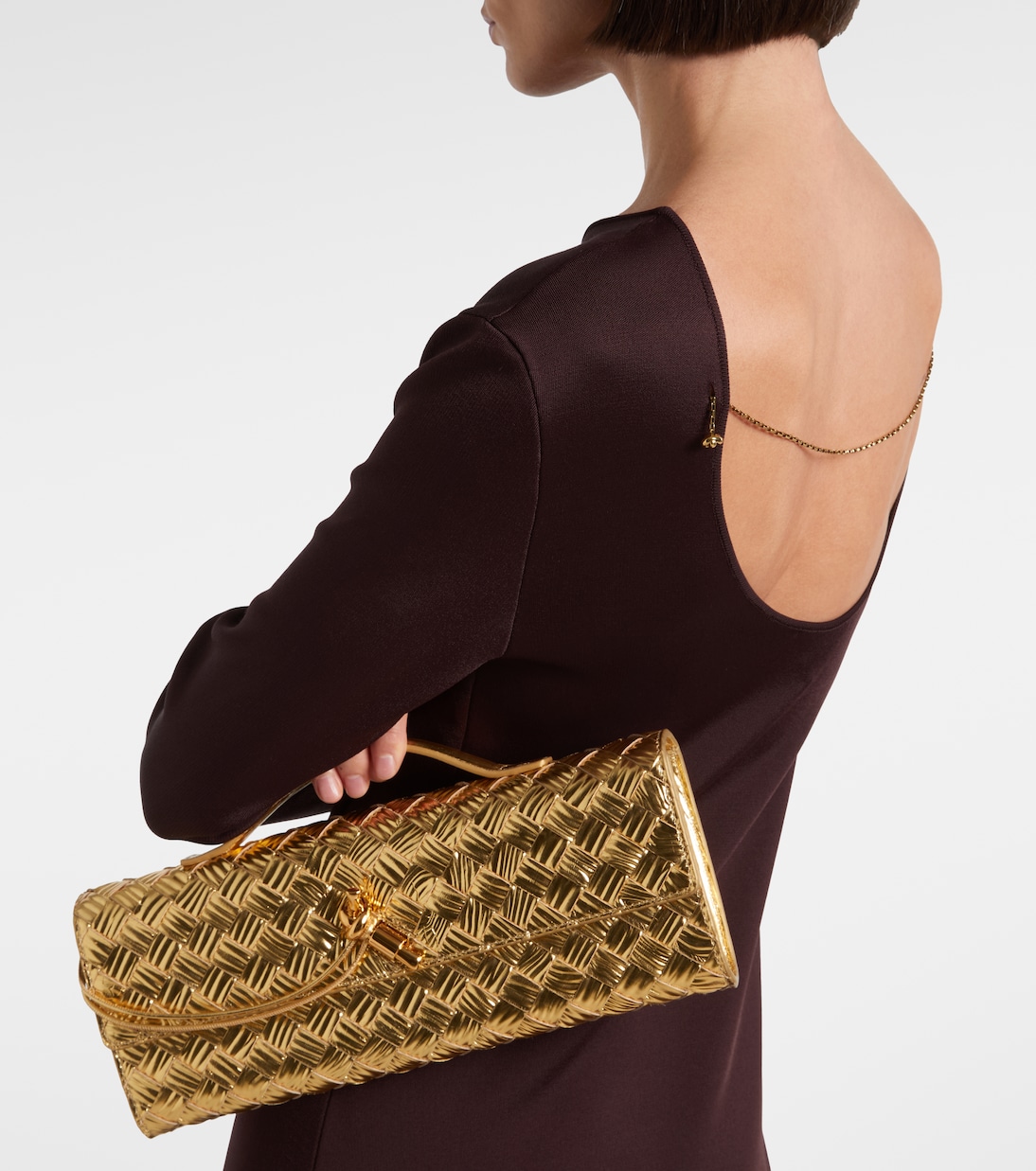 Andiamo Intrecciato metallic leather clutch | Bottega Veneta