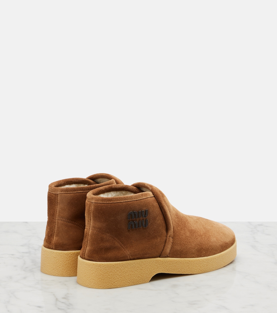 Shearling-lined suede boots | Miu Miu