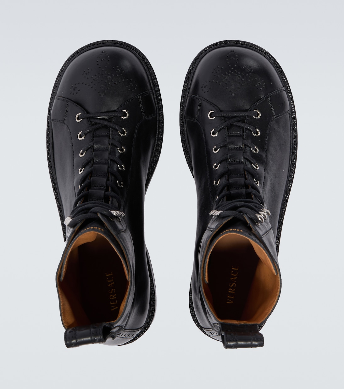 Billy perforated leather combat boots | Versace