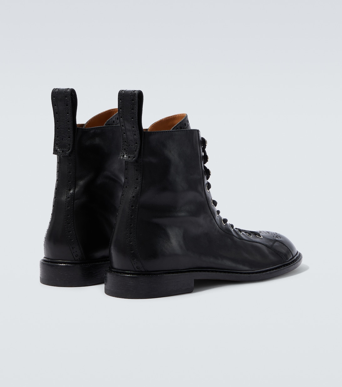Billy perforated leather combat boots | Versace