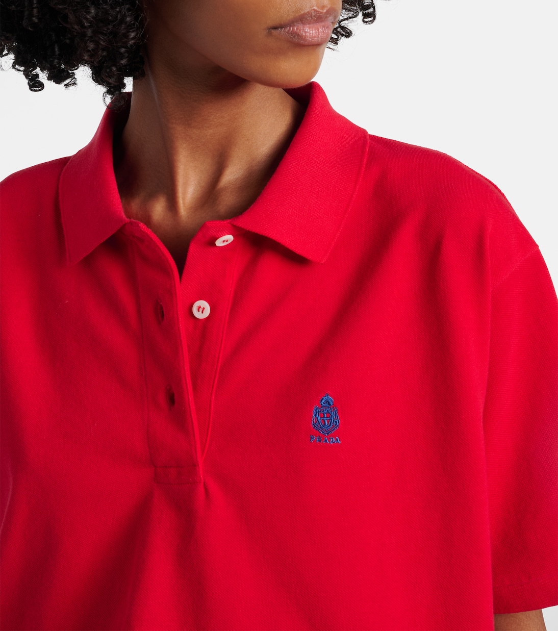 Polo in piqué di cotone con logo | Prada