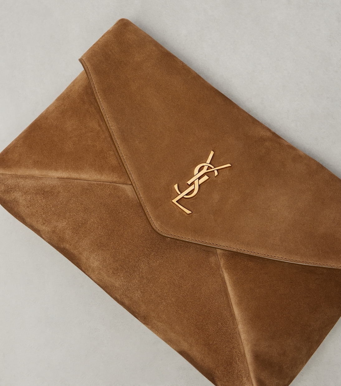 Cassandre Large suede clutch | Saint Laurent
