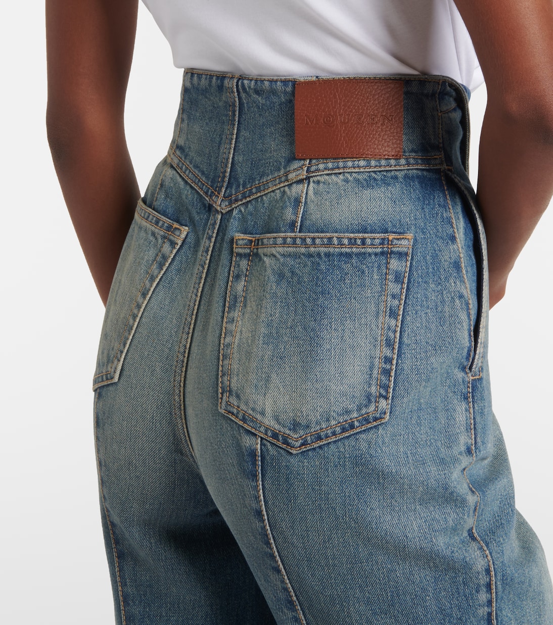 Faded high-rise bootcut jeans | McQueen