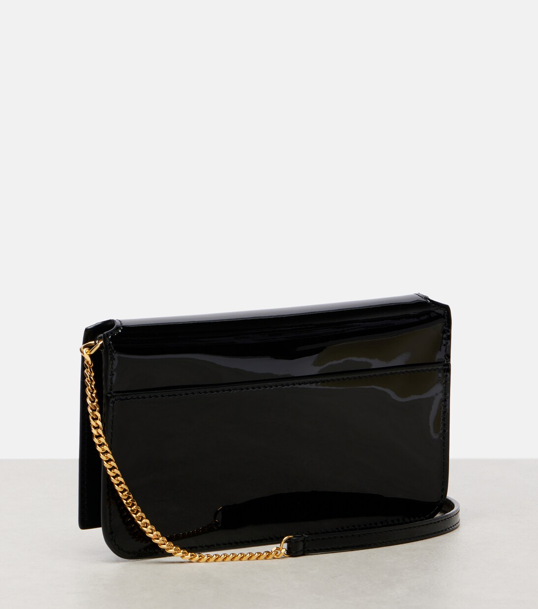 Cassandre patent leather phone pouch | Saint Laurent