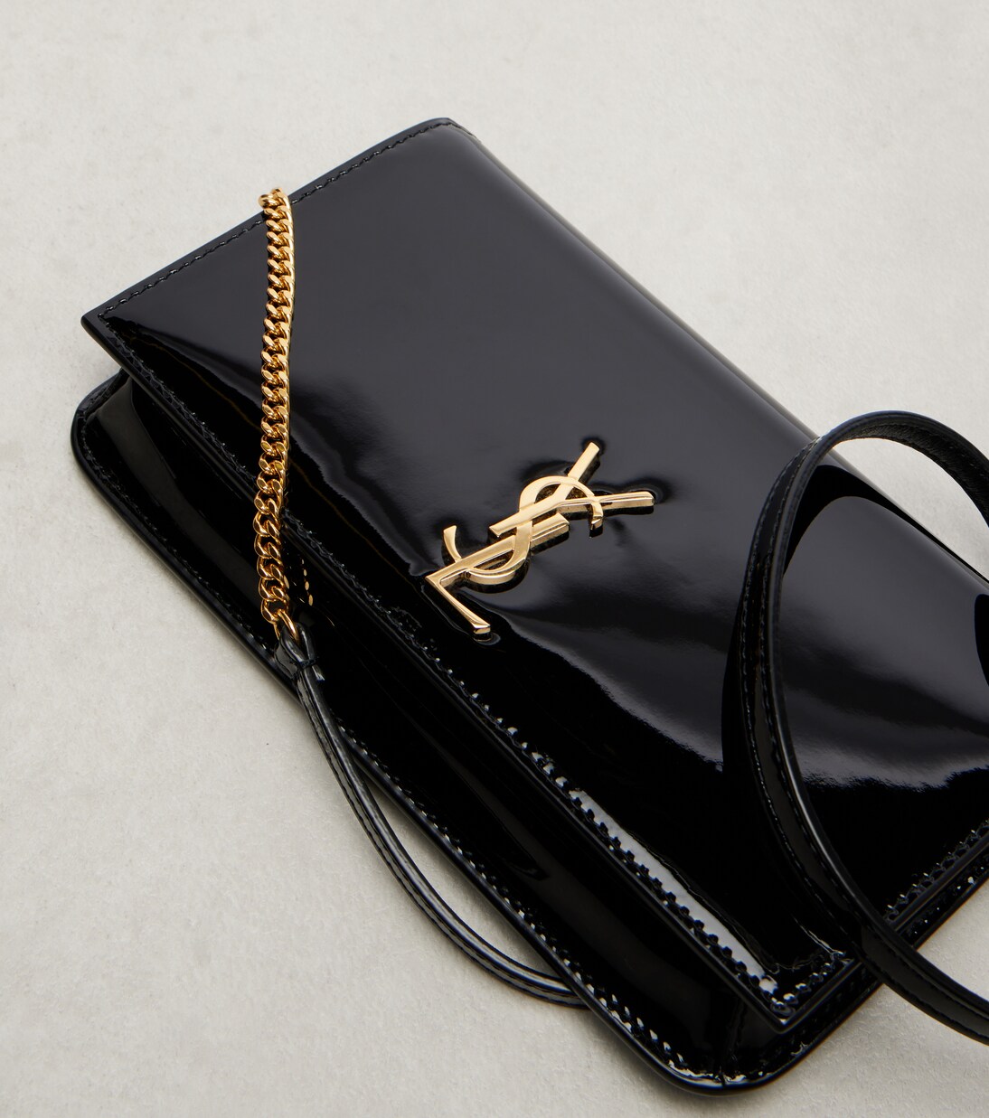 Cassandre patent leather phone pouch | Saint Laurent