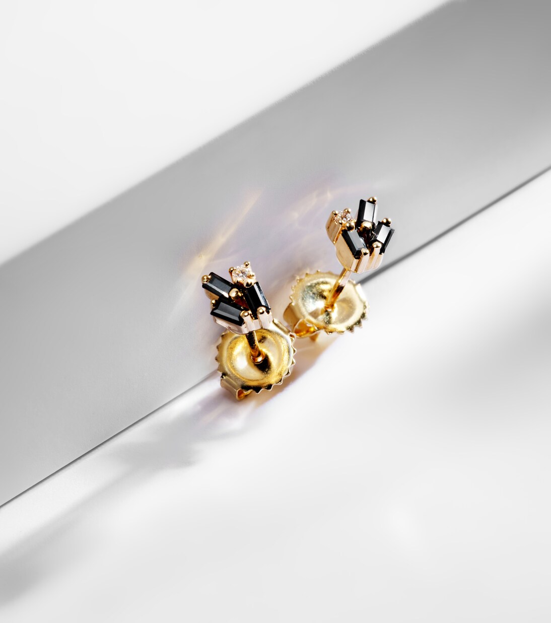 Fireworks 18kt gold earrings with black sapphires and diamonds | Suzanne Kalan