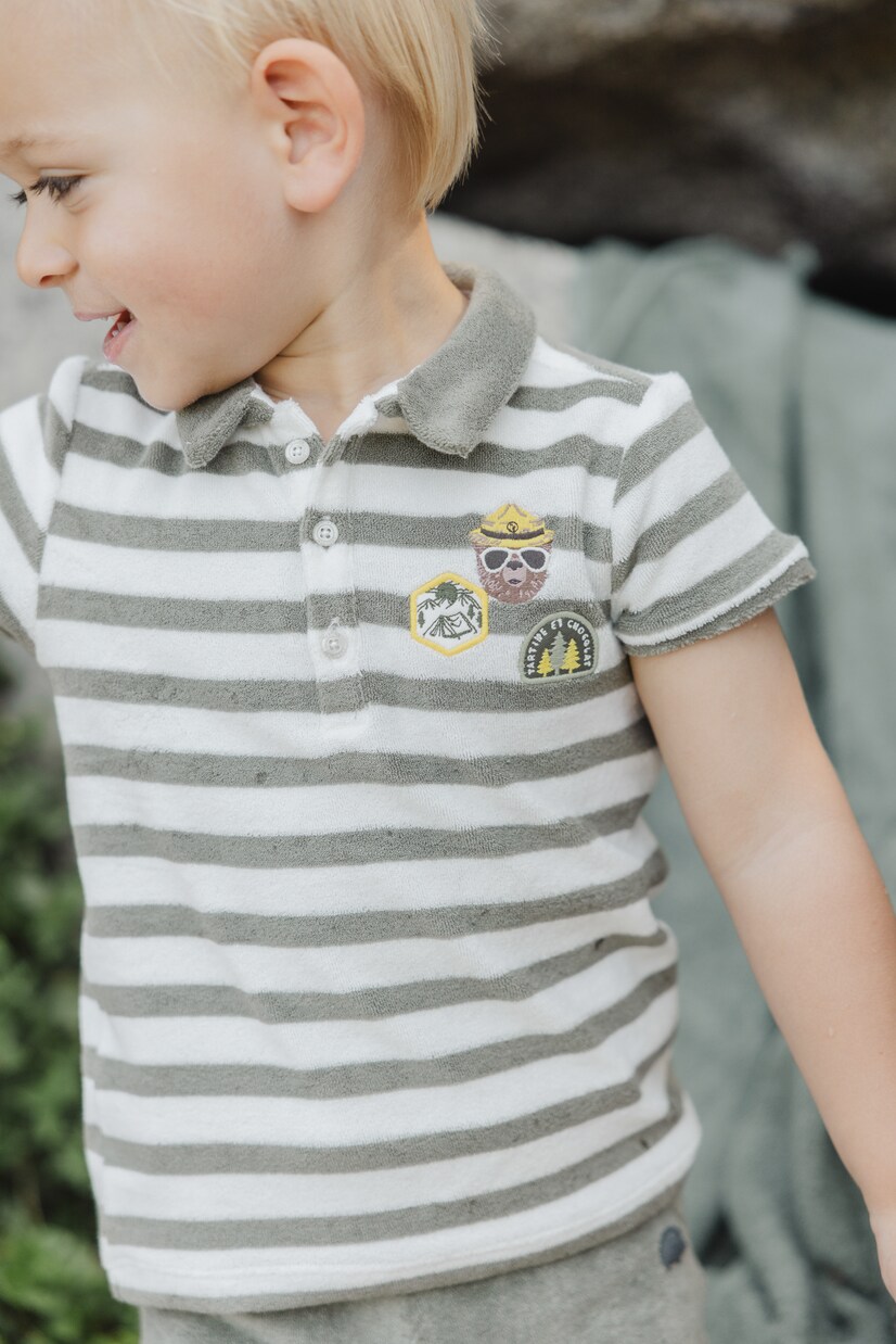 Striped cotton-blend terry polo shirt | Tartine et Chocolat