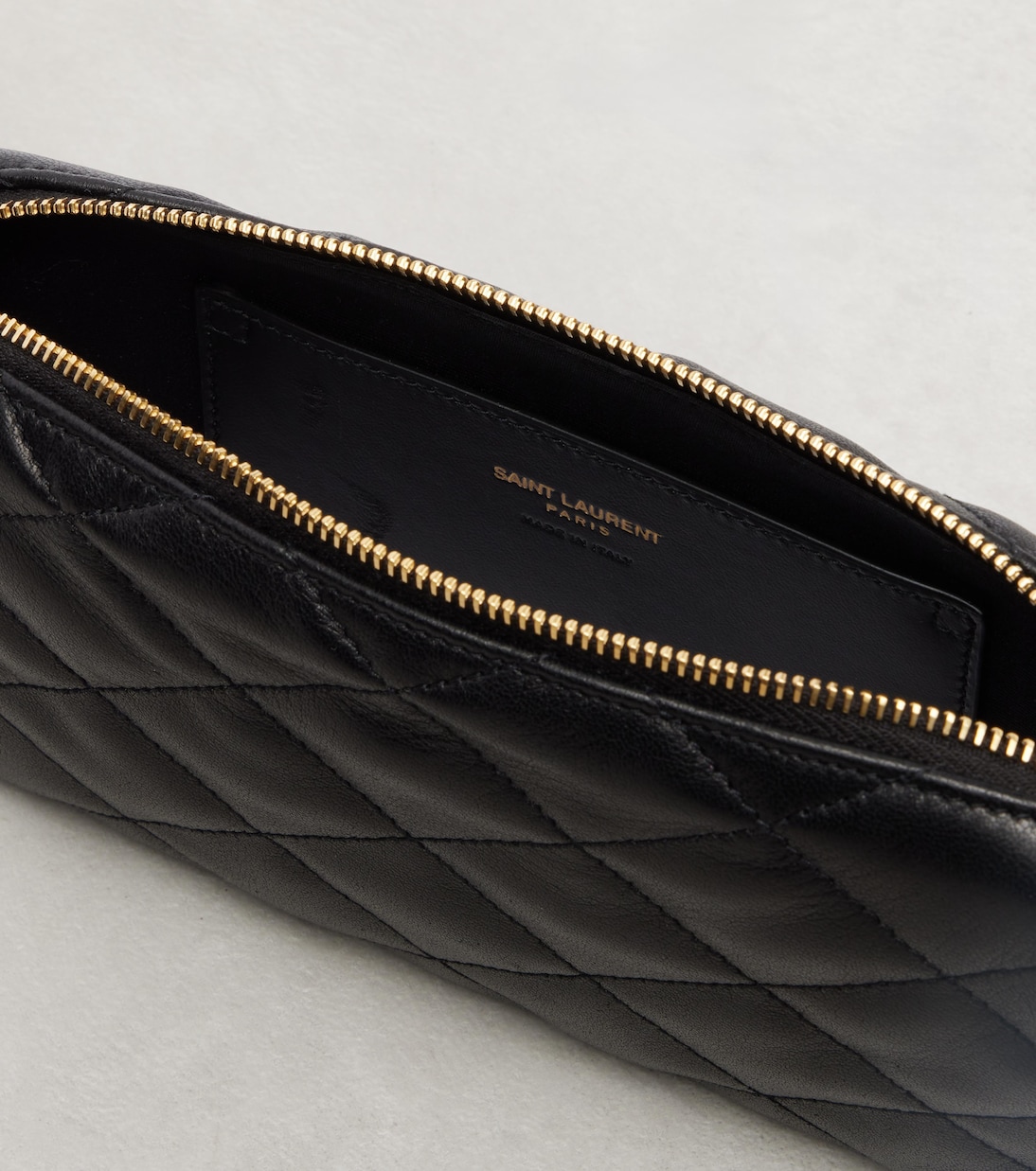 Cassandre quilted leather clutch | Saint Laurent