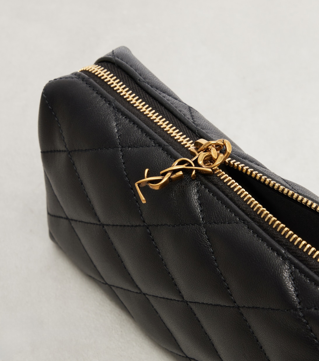 Cassandre quilted leather clutch | Saint Laurent