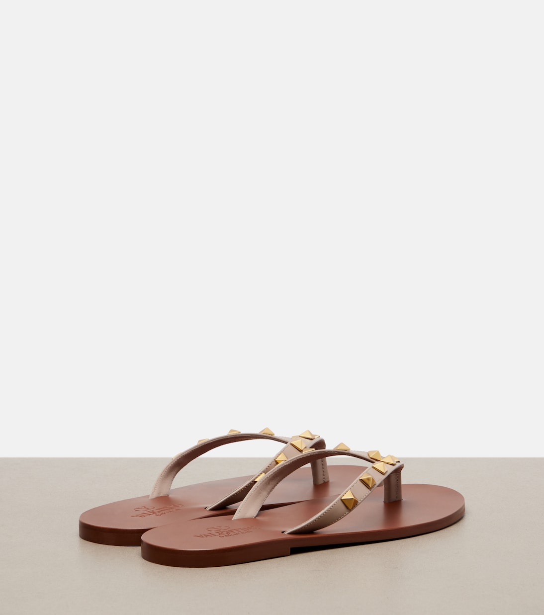 Rockstud leather thong sandals | Valentino Garavani