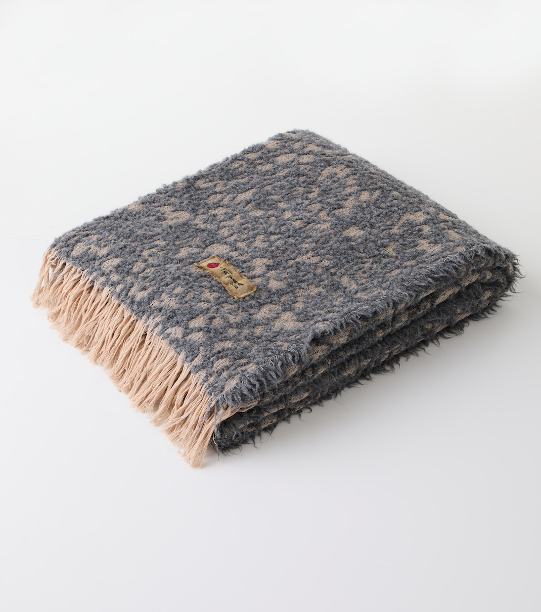 Malghe wool and cotton-blend throw | The House of Lyria