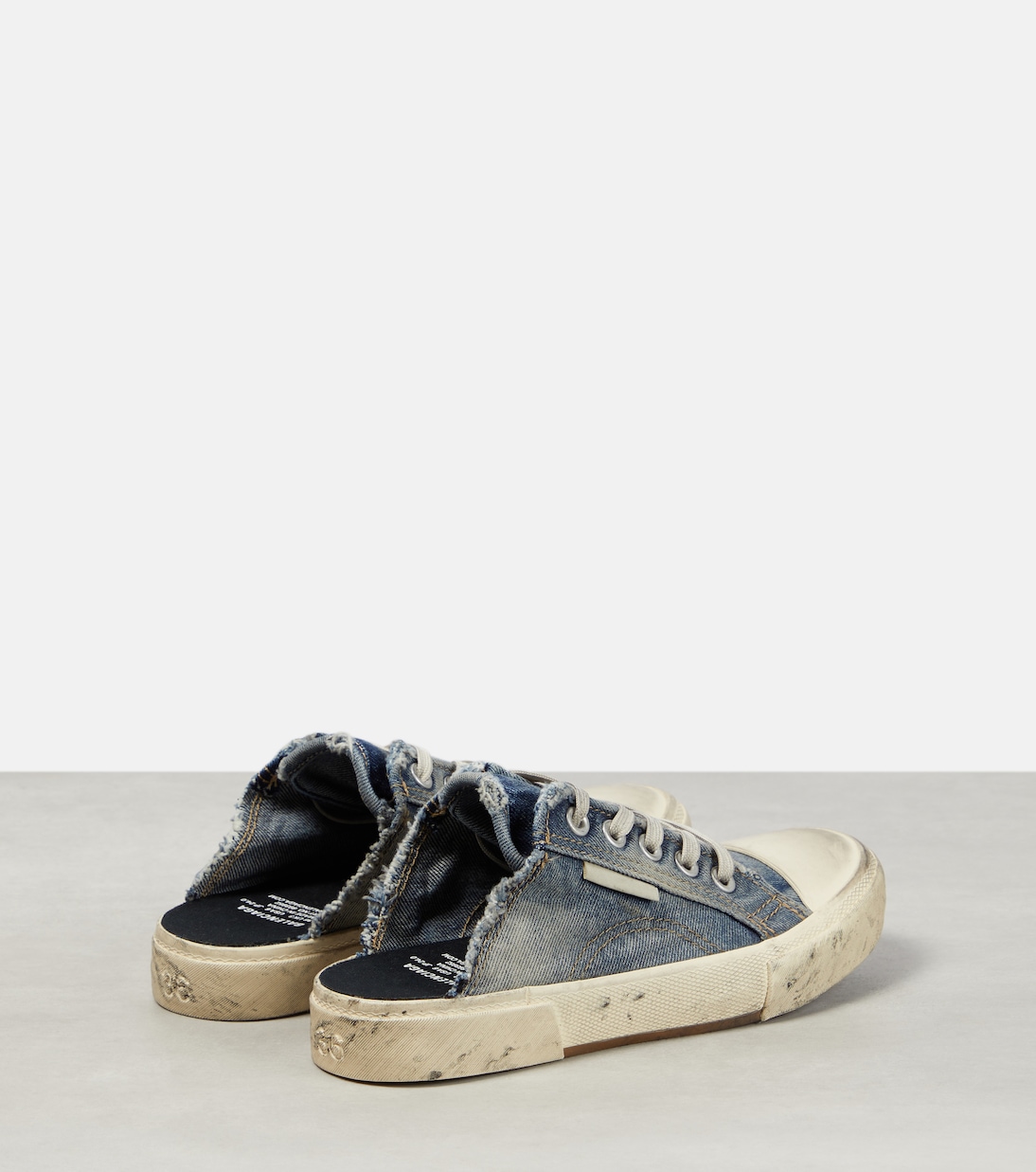 Paris distressed denim mules | Balenciaga