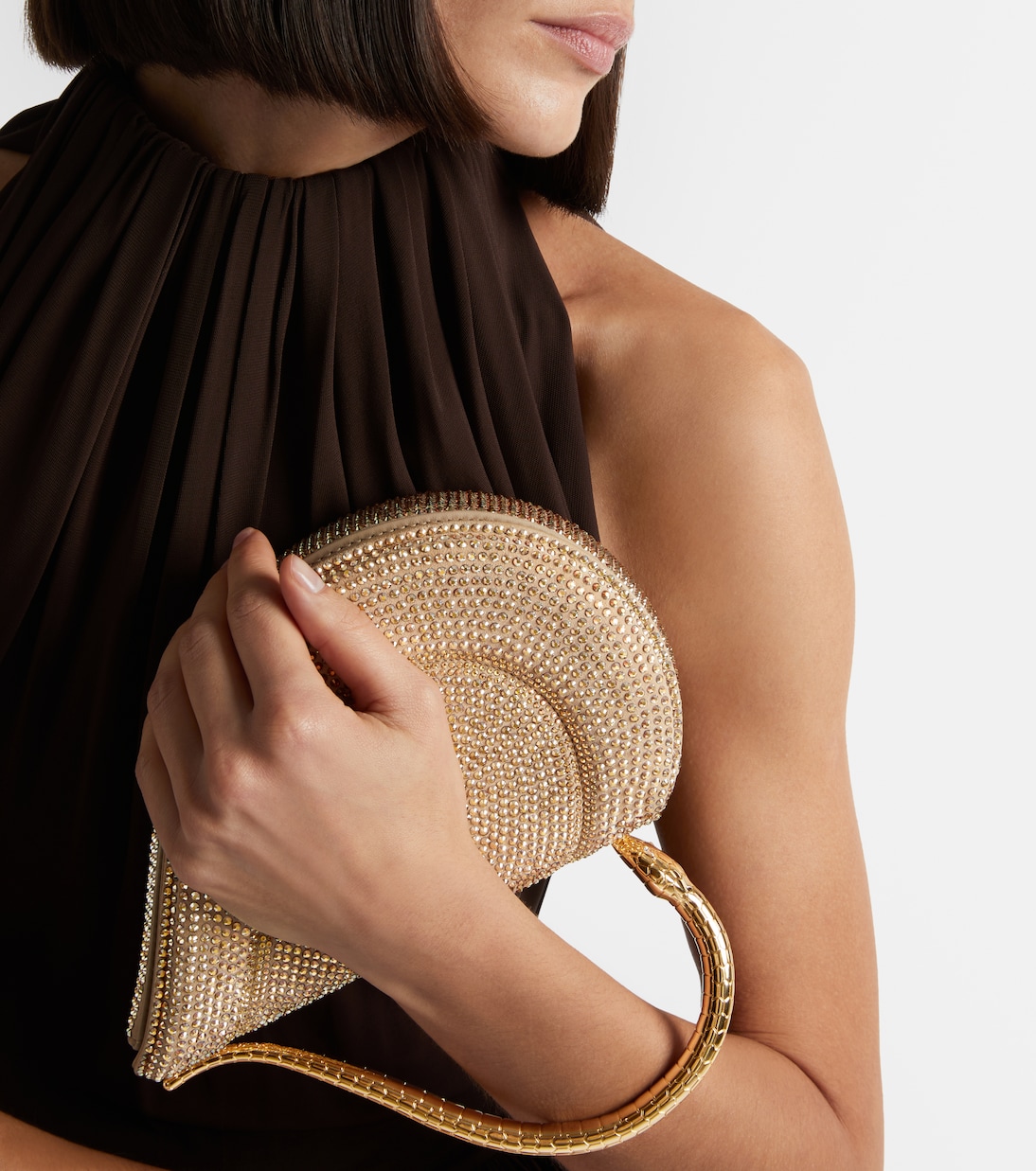 Serpentine Small embellished top-handle bag | Bvlgari