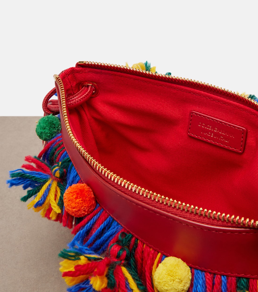 Fringed woven leather-trimmed pouch | Dolce&Gabbana